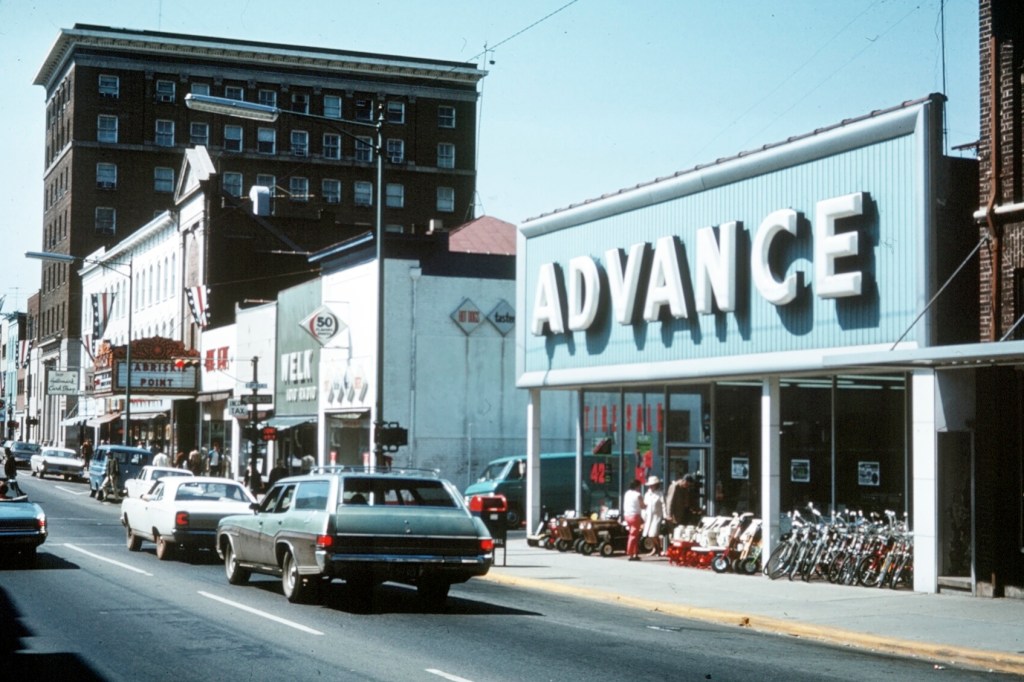 In the years before the Downtown Mall was constructed Main Street had a different look -and many different businesses- than it has today.  The Advance store on the right (selling tillers and bikes in addition to auto parts) sat on the corner of Third and East Main where Vivians and Rapture are now. The Paramount Theater is seen down the street showing the 1970 film, "Zabriskie Point" just a few short years before it would close its doors for 3 decades. Also visible is a group of buildings to the west (left) of the Paramount that would be lost to fire in 1973. At this point in its history Main Street was a one-way street with traffic flowing west. -- Steve Trumbull
