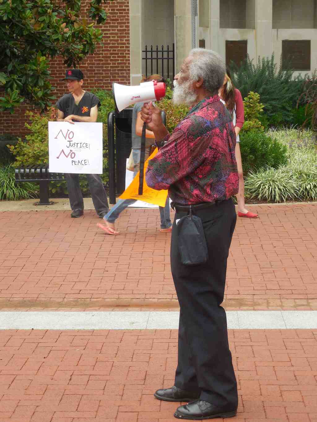 “I sing and give my voice to the cause I am protesting…”